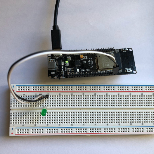 ESP32 with LED connected to it, running the Morse code example